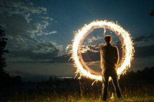 Man at night with sparkler